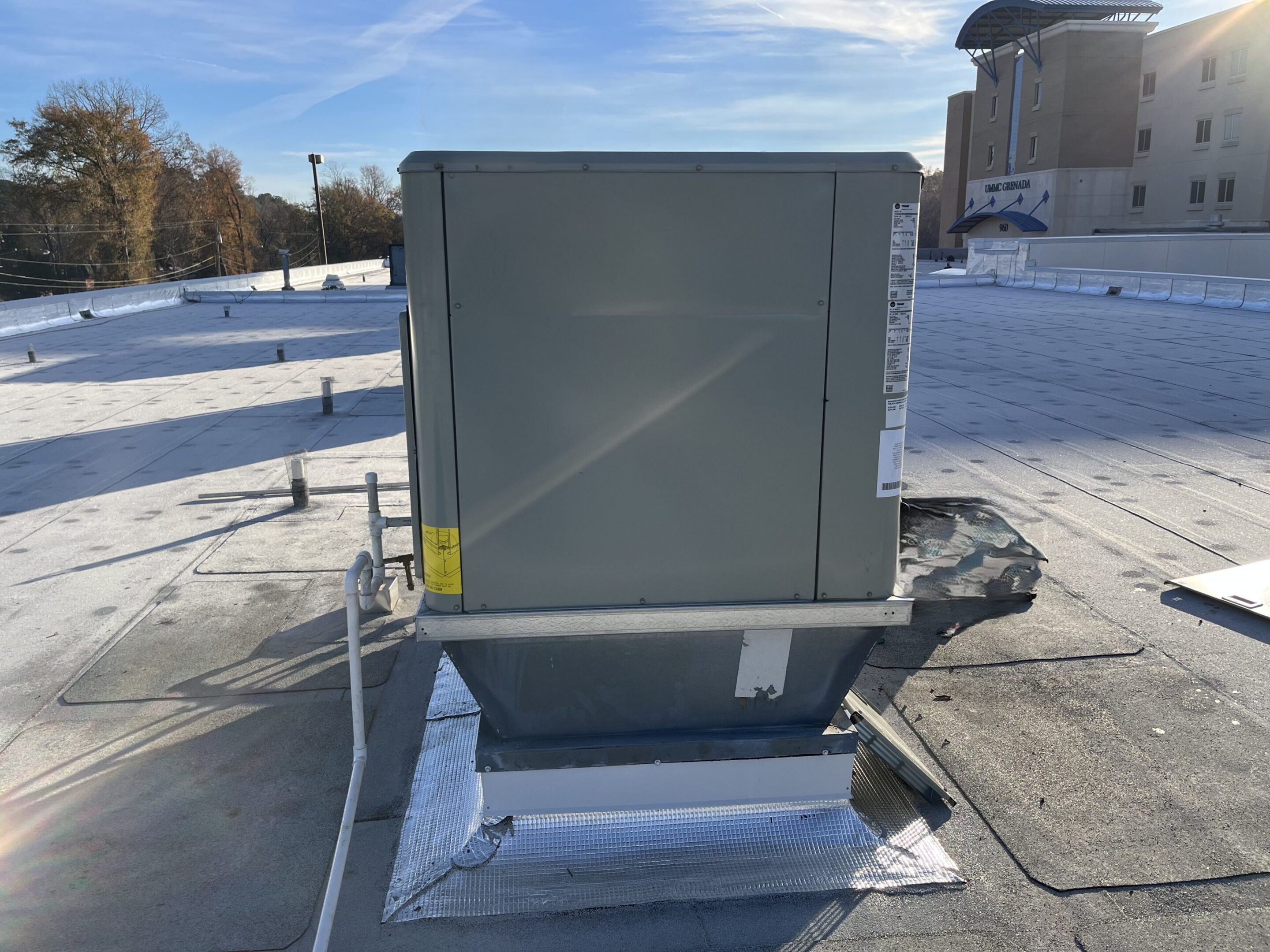 Rooftop HVAC unit on flat commercial roof