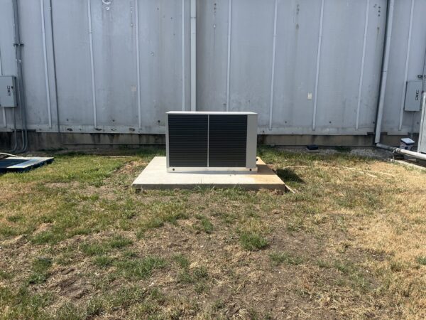 Outdoor HVAC unit on concrete pad