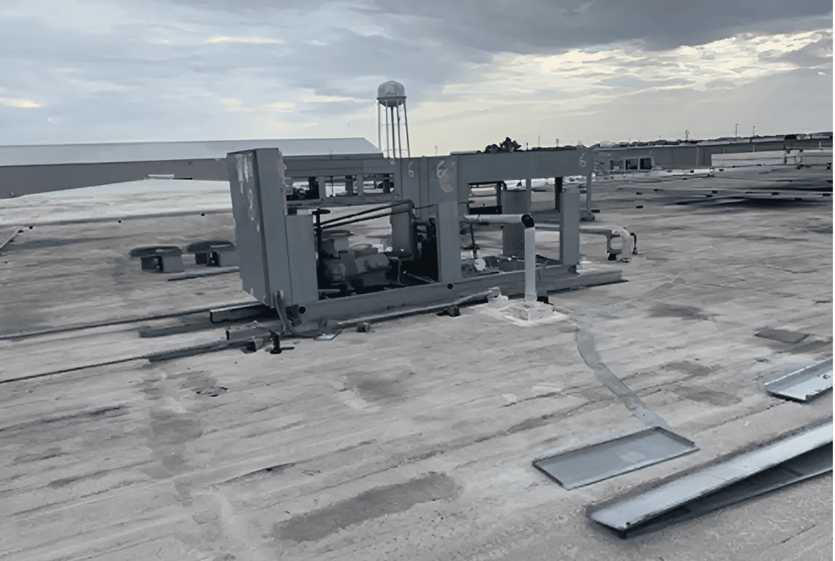 Commercial rooftop HVAC units on flat roof